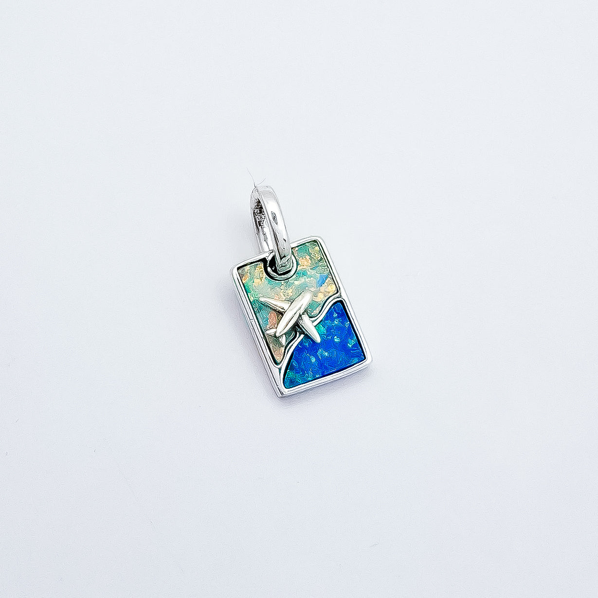 Charm Pasaporte Opalo