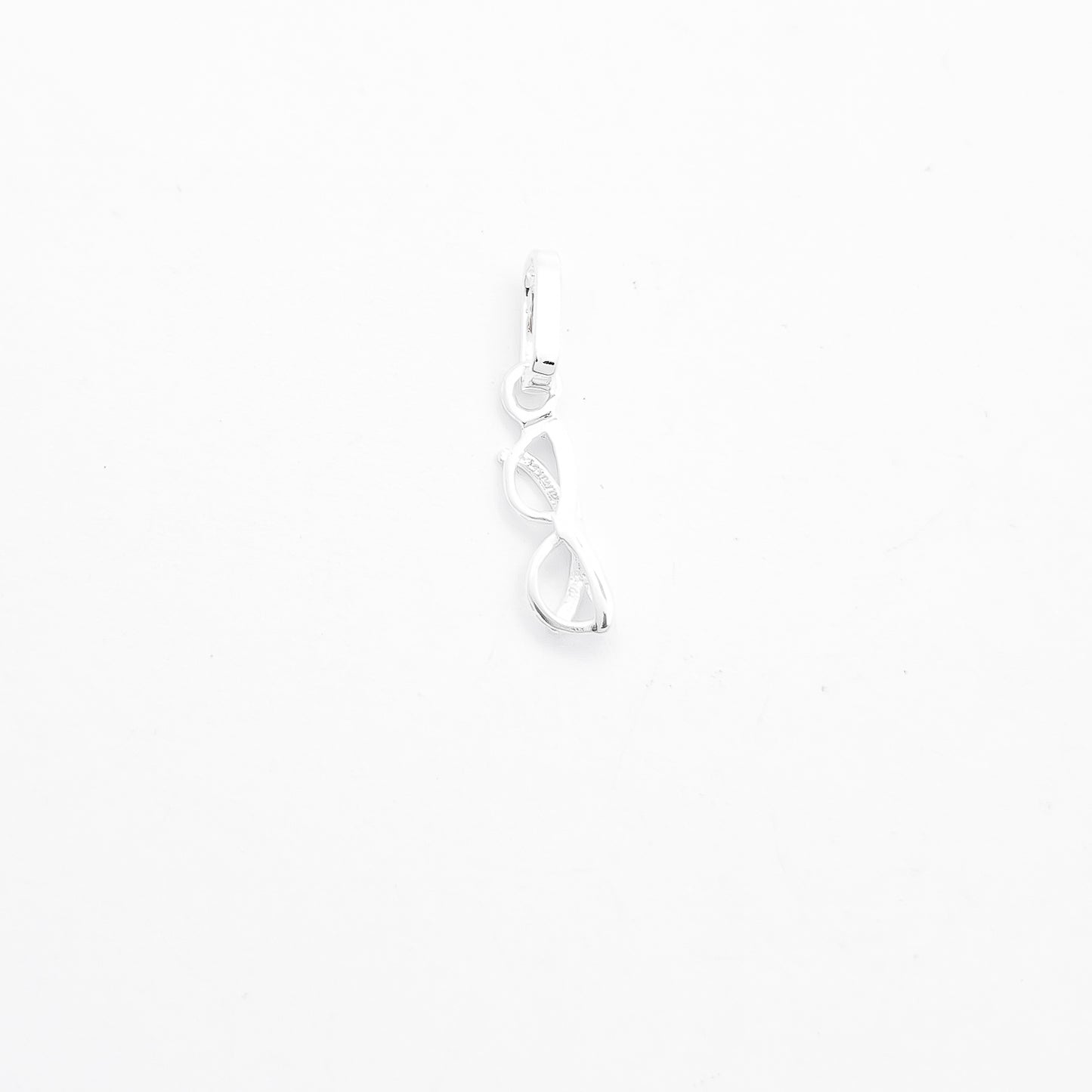 Dije Lente Blanco