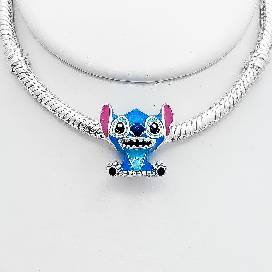 Charm Stich Sentado