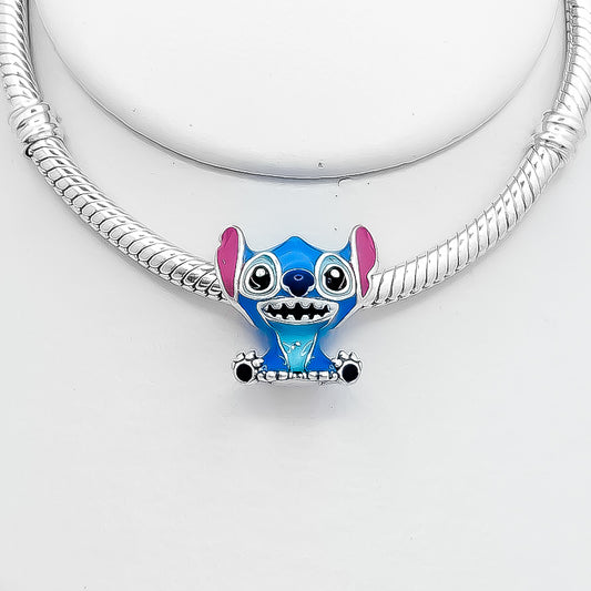Charm Stich Sentado