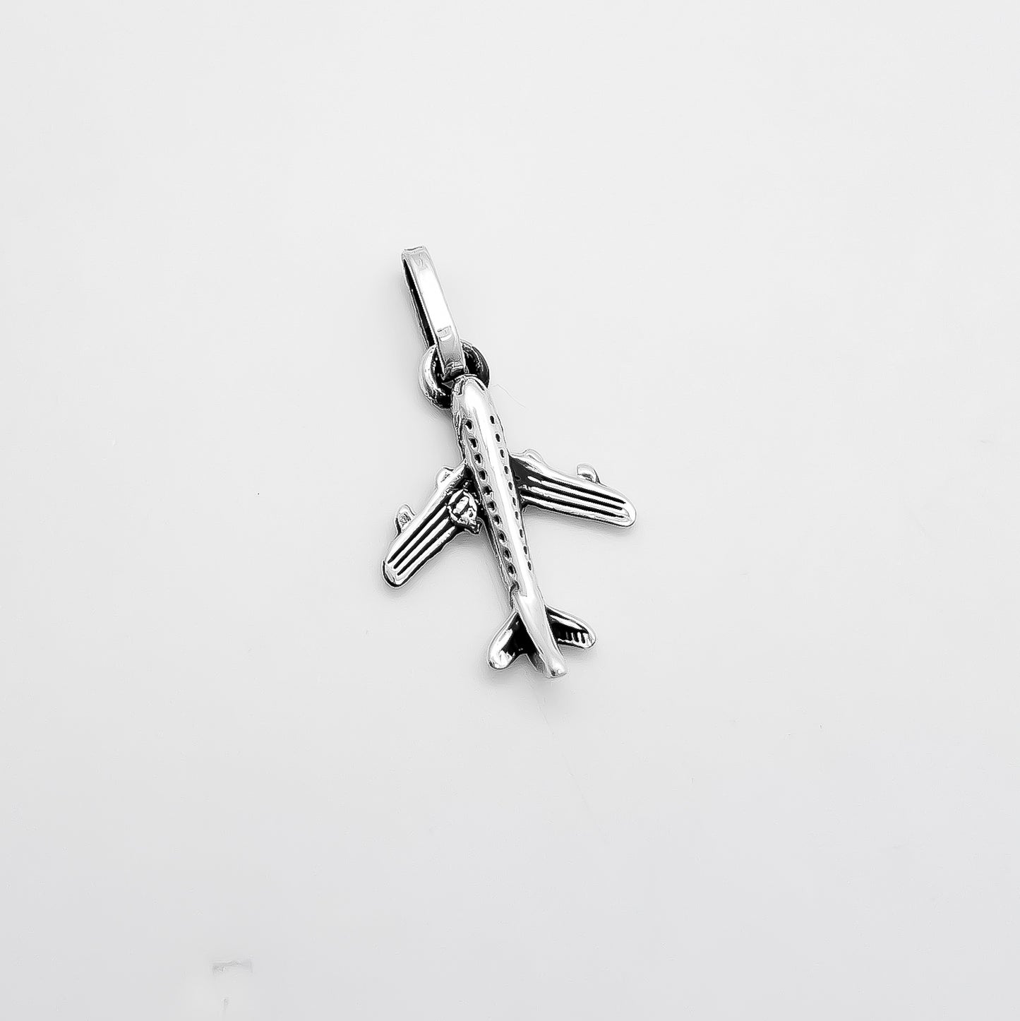 Dije Avioncito Pavonado