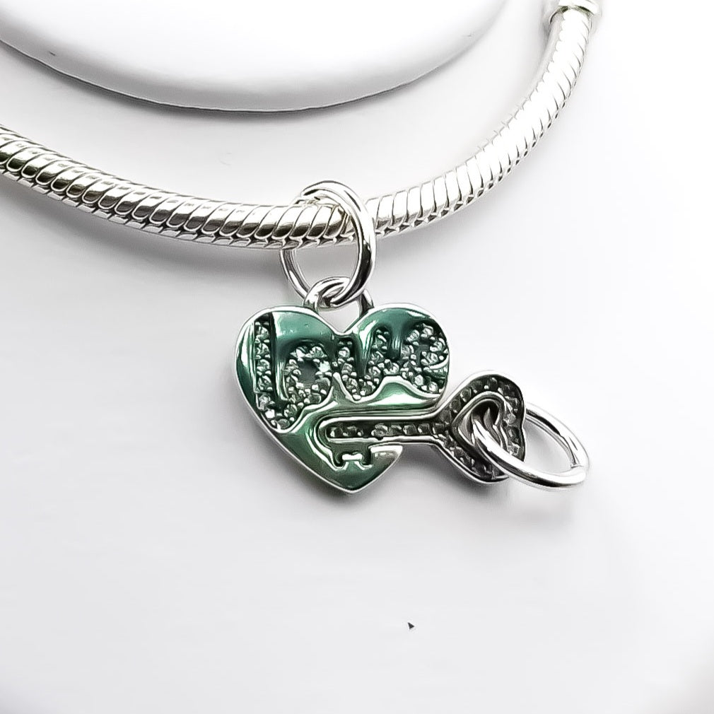 Charm Corazon Llave Duo (Cambia Color)