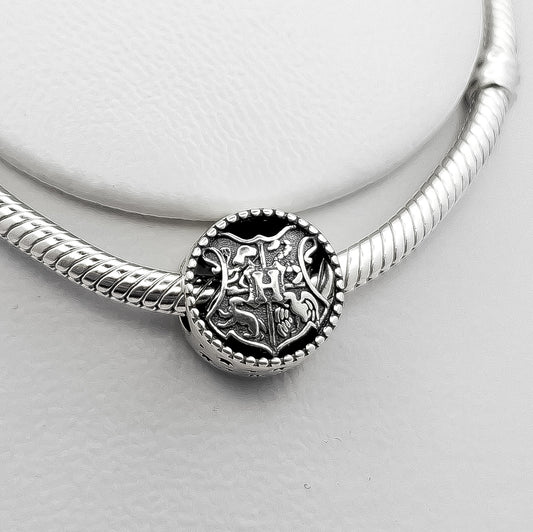 Charm Escudo