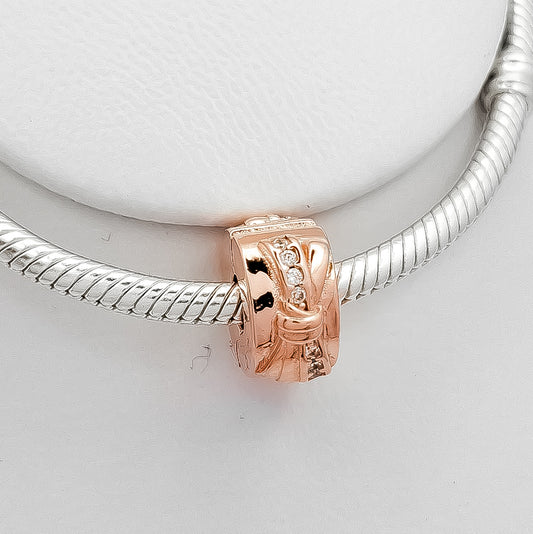 Charm Moño Seguro Plata Rosa