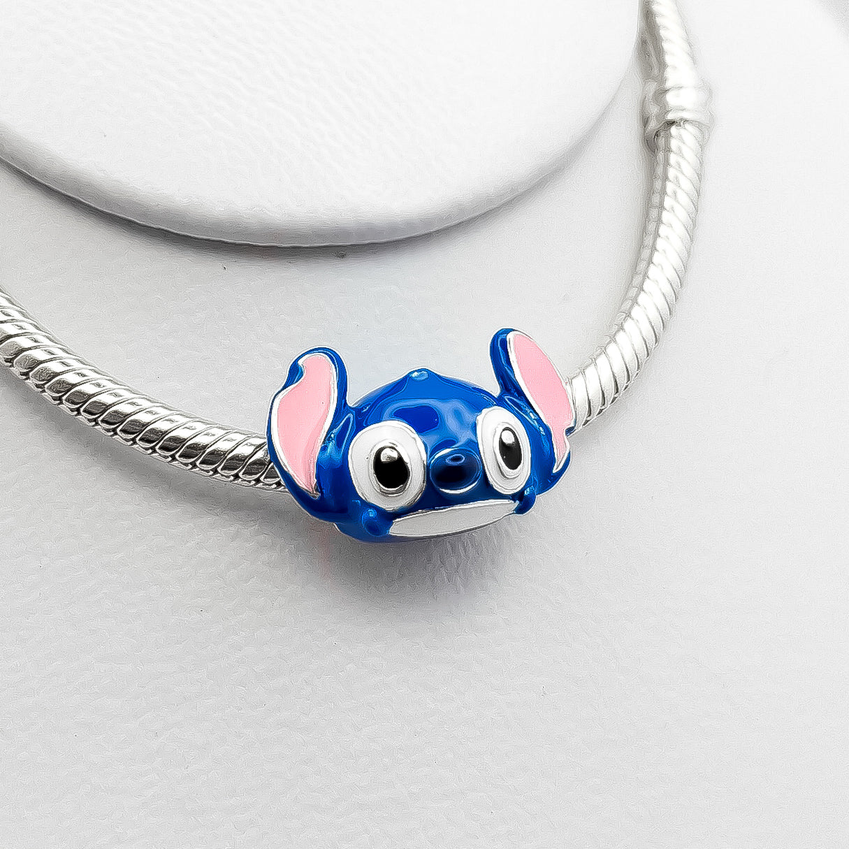 Charm Cabeza Stich