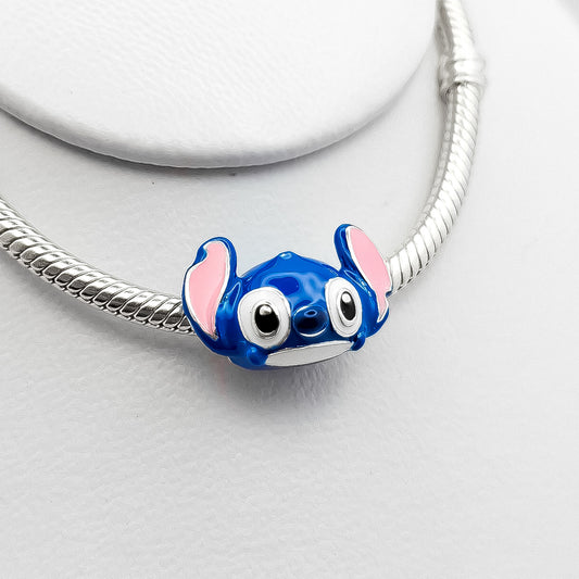 Charm Cabeza Stich
