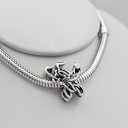 Charm Silueta Pluto